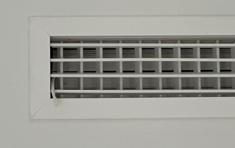 White air vent on a wall