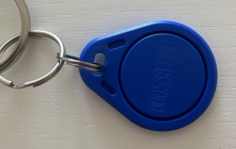 Blue key fob with identification number